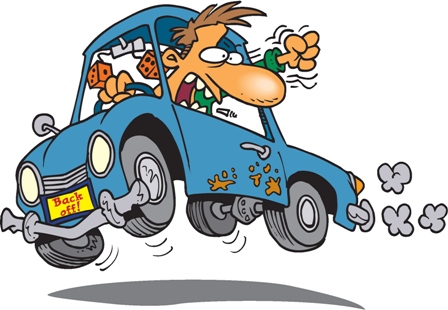 Angry Driver With A Clenched Fist Shouting