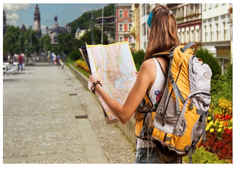 Cute Backpacker Girl Reading Map