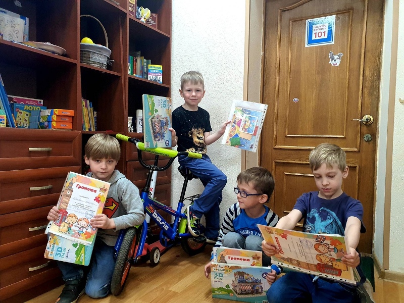 School Children Discovering Tales In English